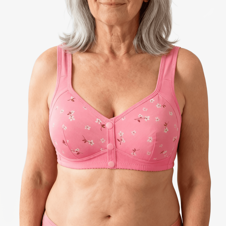 Pink floral print front-button bra worn on a body