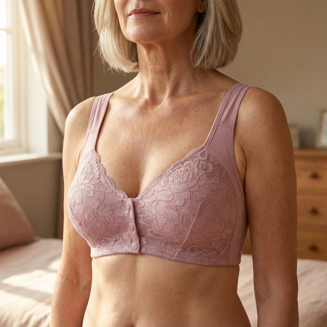 Dusty pink front-snap bra with a lace overlay and wide straps