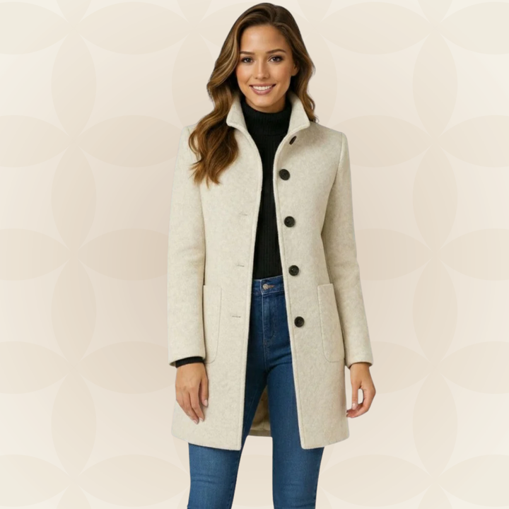 Ivory high collar button-front wool coat worn with jeans