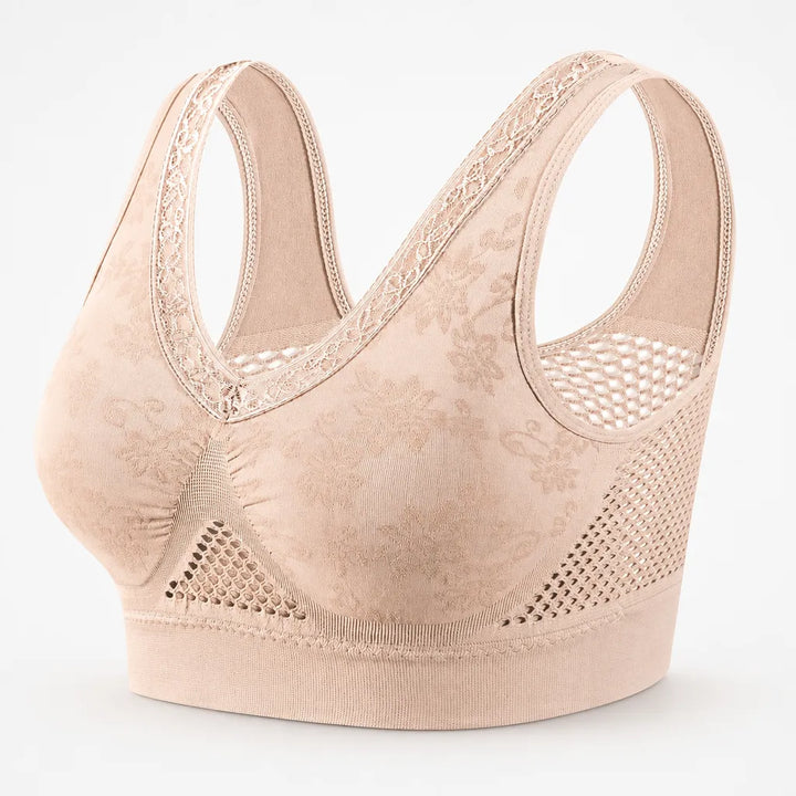 Blush lace trimmed wireless bra with mesh side panels