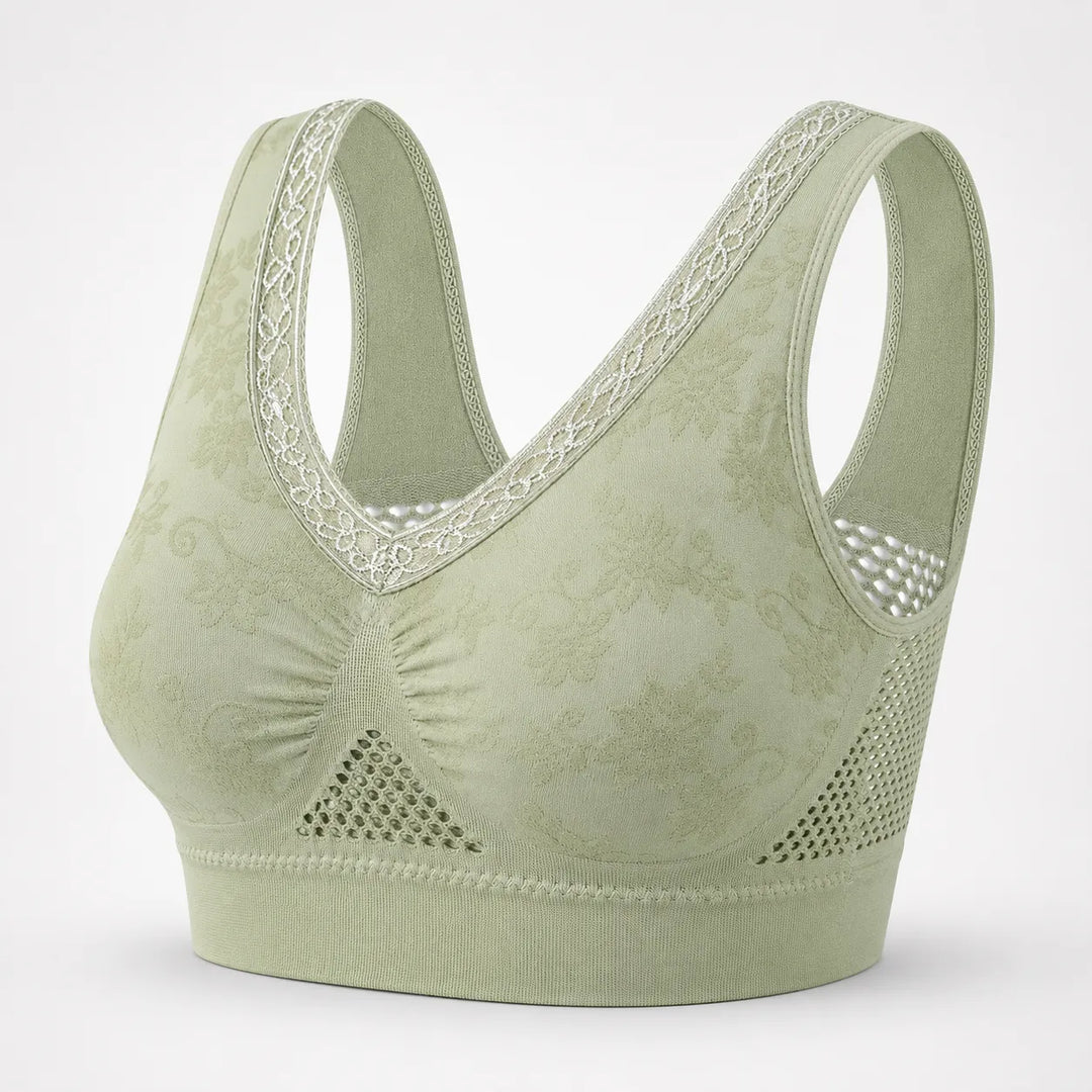 Sage green lace trimmed wireless bra with mesh side panels