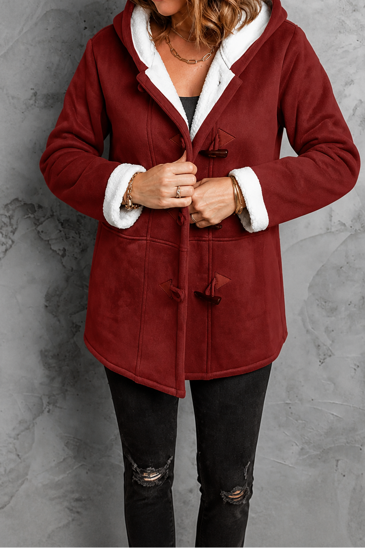 Red faux suede hooded coat with a plush lining and toggle buttons