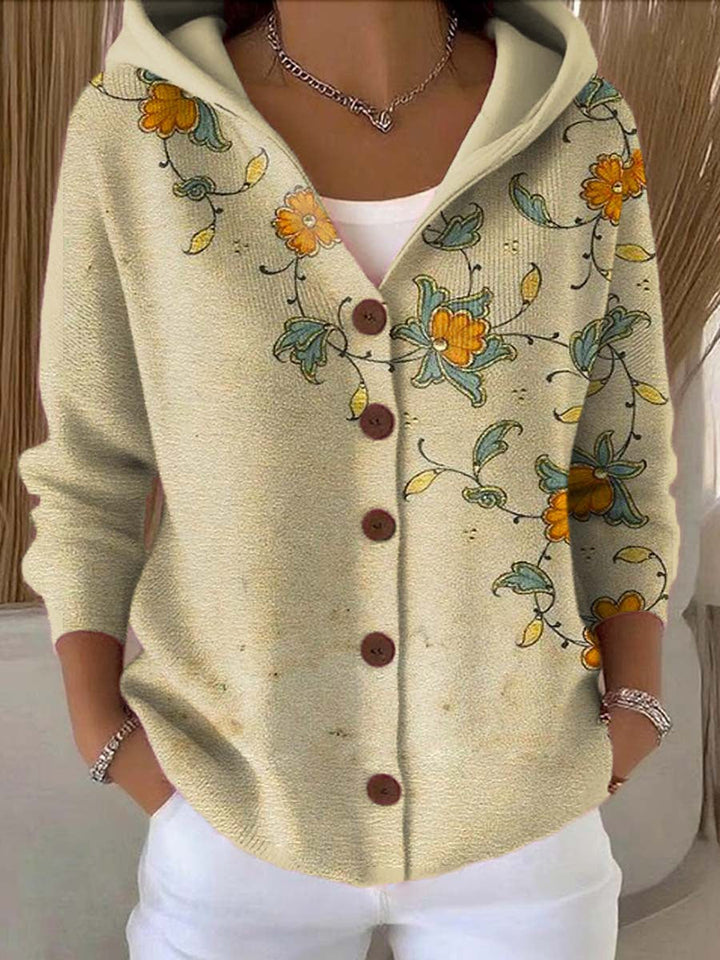 Cream hooded knit cardigan with a trailing floral print