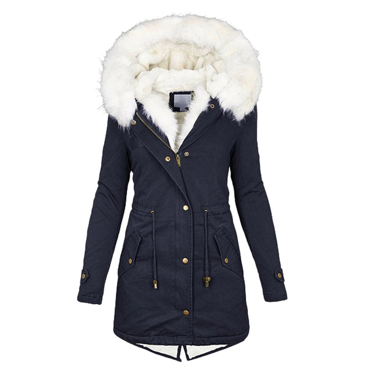 Navy hooded winter parka with a cream faux fur hood trim