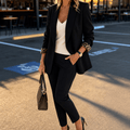 Black tailored blazer with leopard print lined turnback cuffs