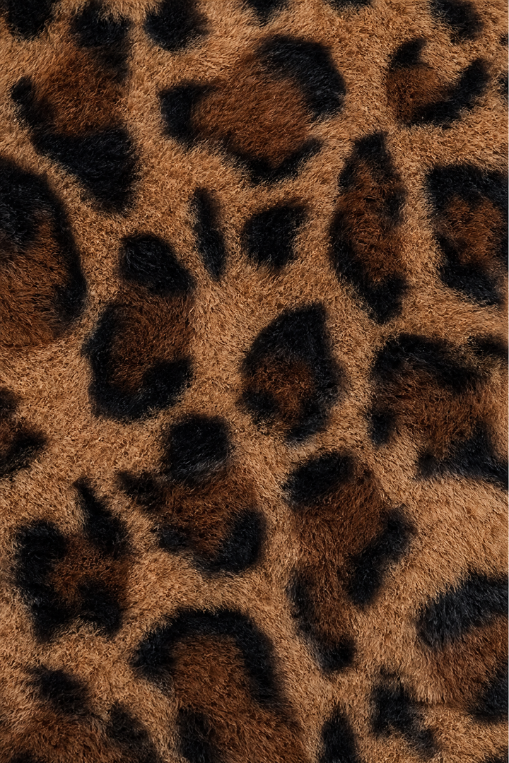 Close up of the leopard spot pattern on faux fur