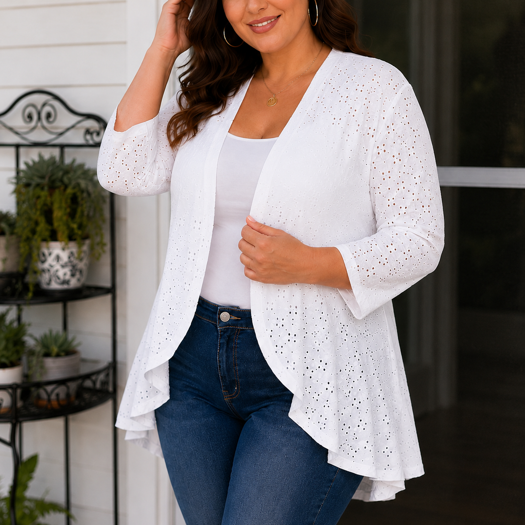 White lightweight eyelet open front cardigan with a draped hem