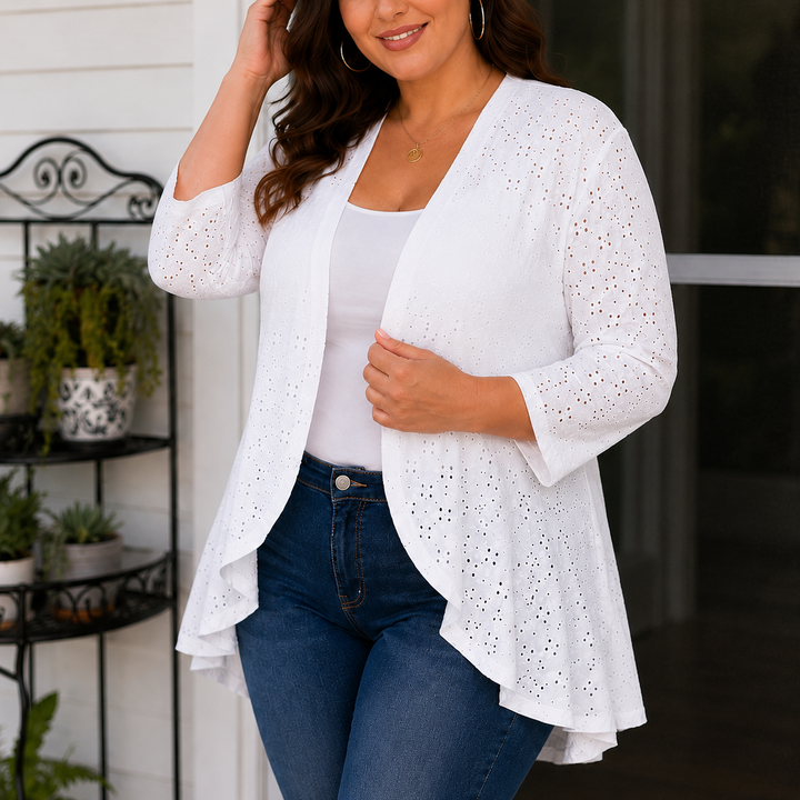 White lightweight eyelet open front cardigan with a draped hem