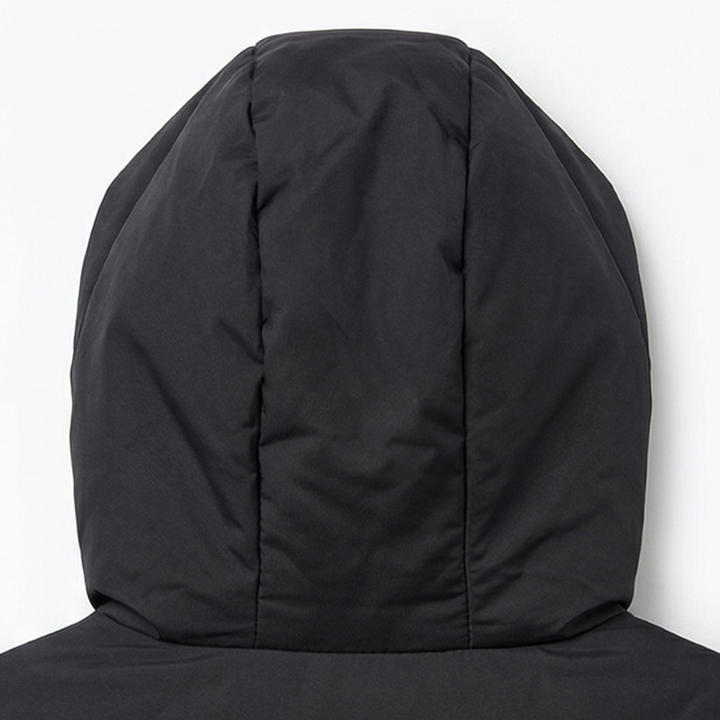 Close up of the padded hood on a black quilted puffer vest