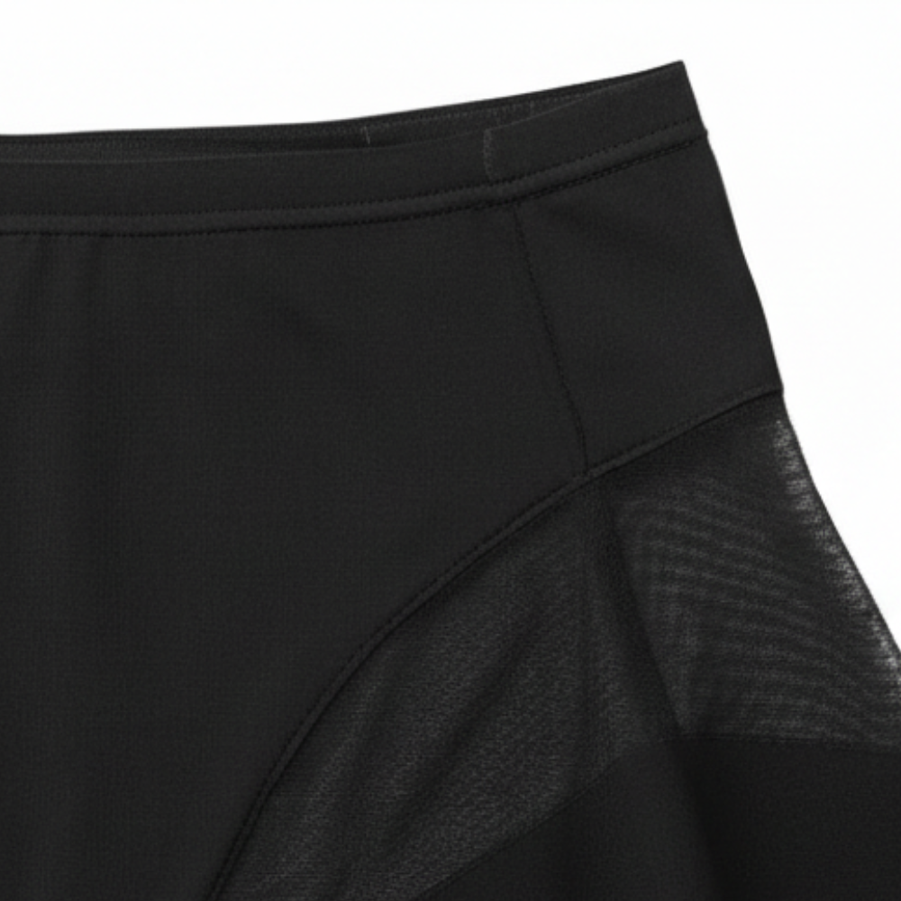 Close-up of the flat waistband seam on black briefs