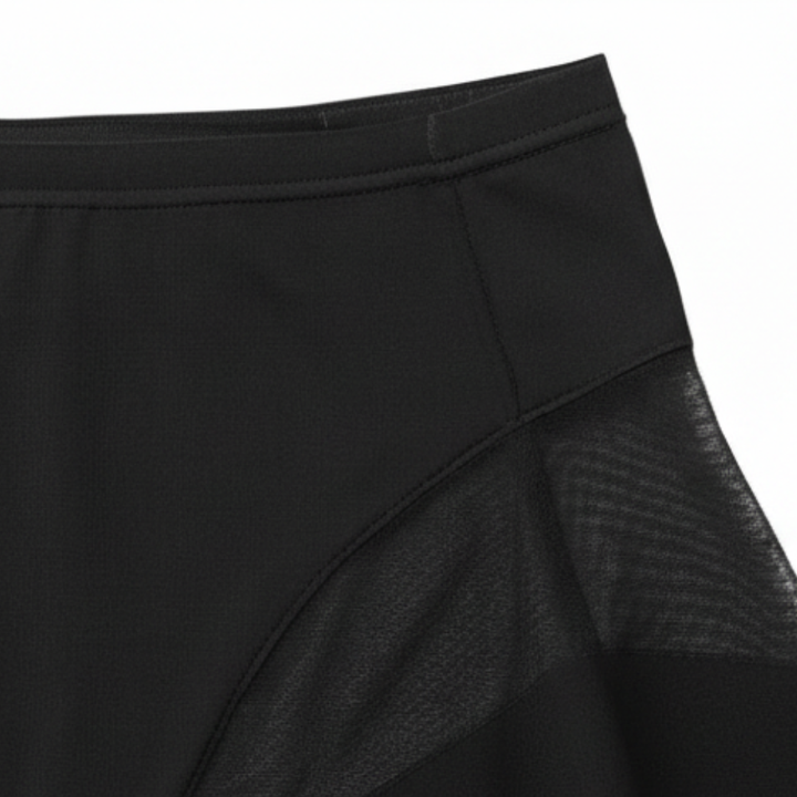 Close-up of the flat waistband seam on black briefs