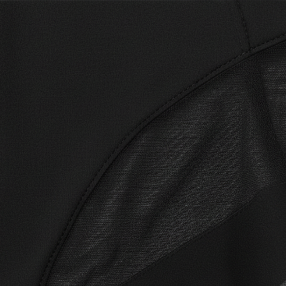 Close-up of the mesh weave on black brief fabric