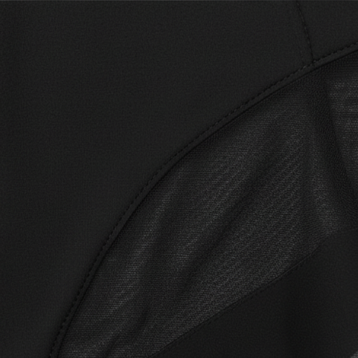 Close-up of the mesh weave on black brief fabric