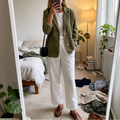Olive corduroy blazer with a notch collar and cream trousers