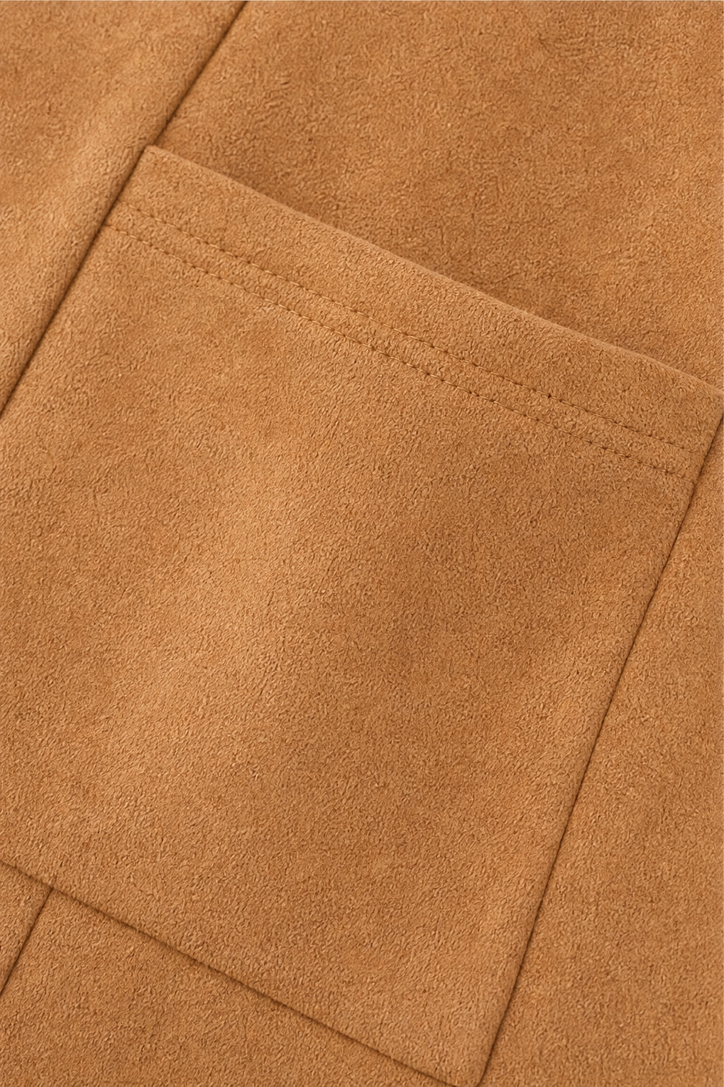 Patch pocket on a camel faux suede longline vest