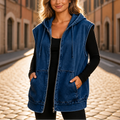 Mid blue oversized hooded denim vest with a zip front and pockets