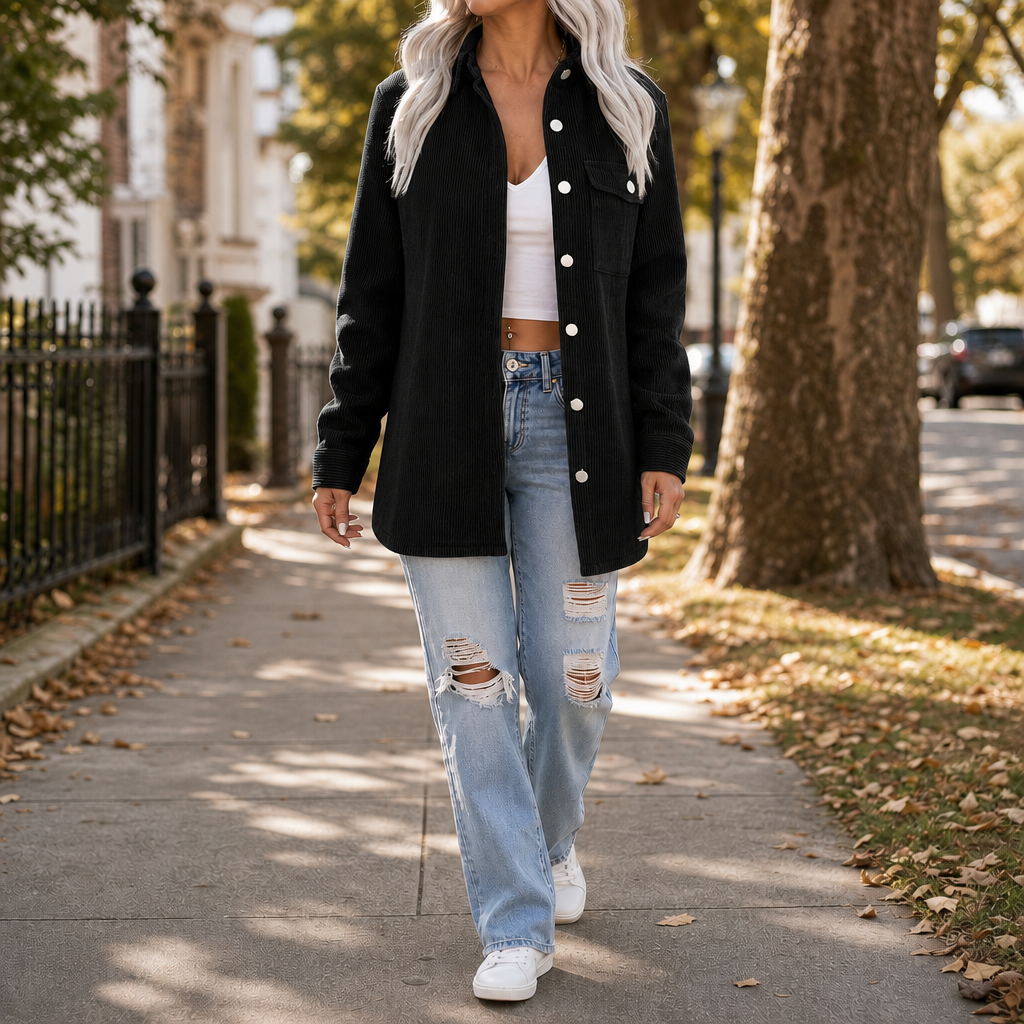 Black wide wale corduroy shirt jacket on an autumn street