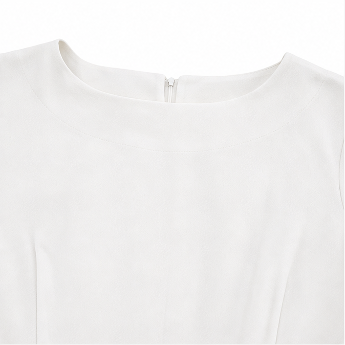 Close-up of the white dress neckline with a concealed back zip