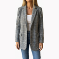 Grey plaid relaxed blazer with notch lapels and flap pockets
