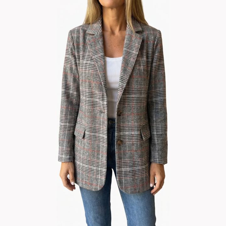 Grey and pink plaid lapel blazer worn open over a white top