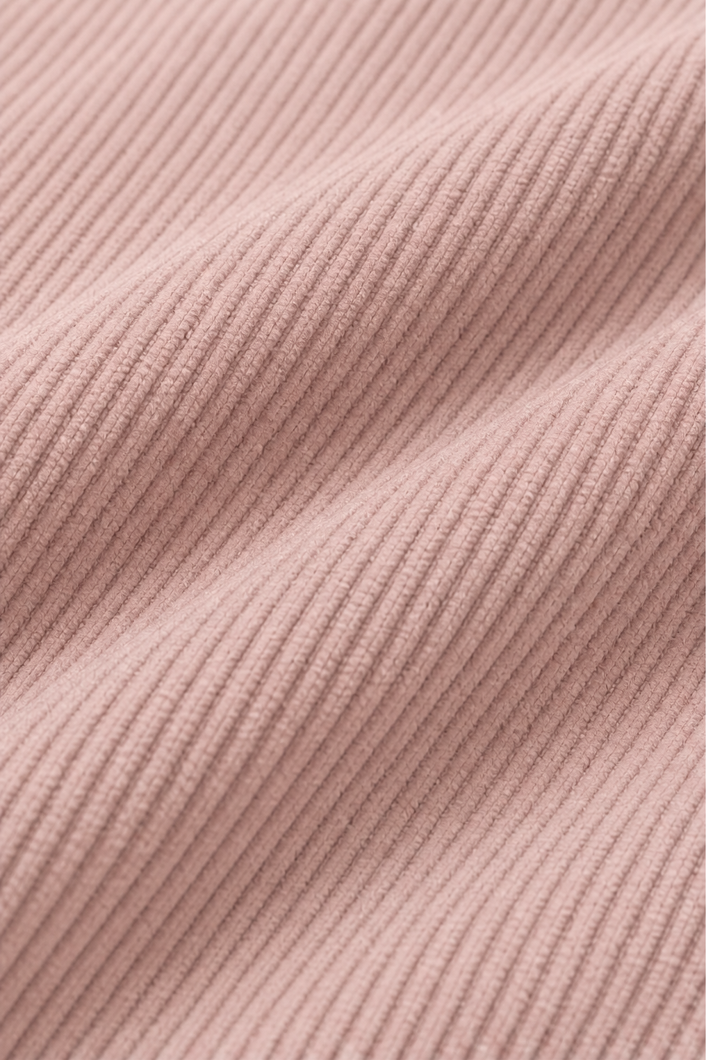 Close up of the mauve ribbed corduroy look knit