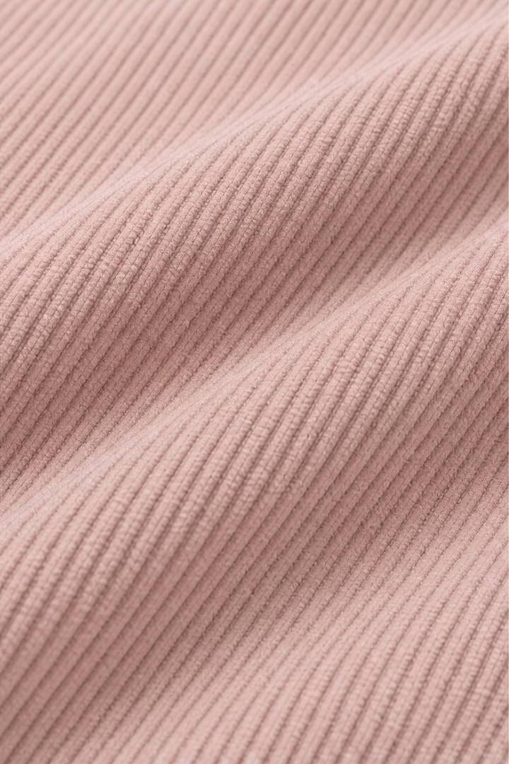 Close up of the mauve ribbed corduroy look knit