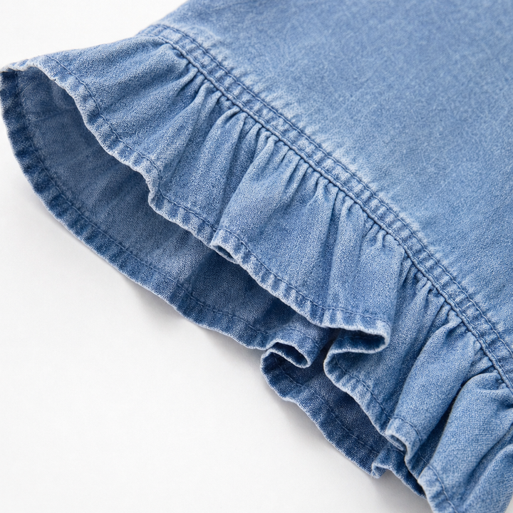 Ruffled sleeve cuff detail on a denim cardigan