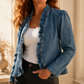 Blue denim jacket with ruffled open front and puff shoulders