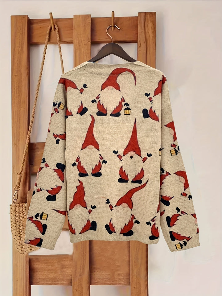 Back of a beige long sleeve cardigan with red and black gnome print, shown on a wooden hanger