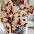 Close up of a cream knit cardigan with a red gnome print and dark buttons