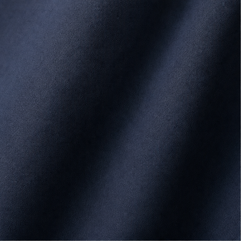 Close up of the smooth navy windbreaker fabric