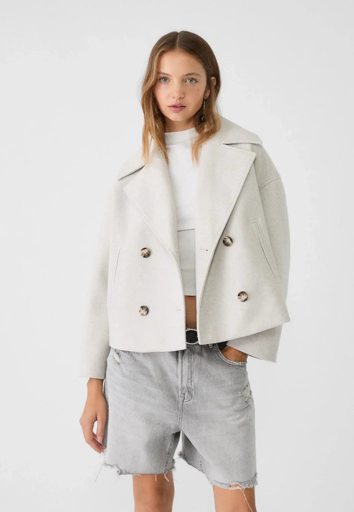 Ivory short double-breasted jacket with a wide collar