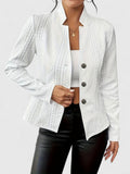 White cable textured stand collar jacket over leather trousers