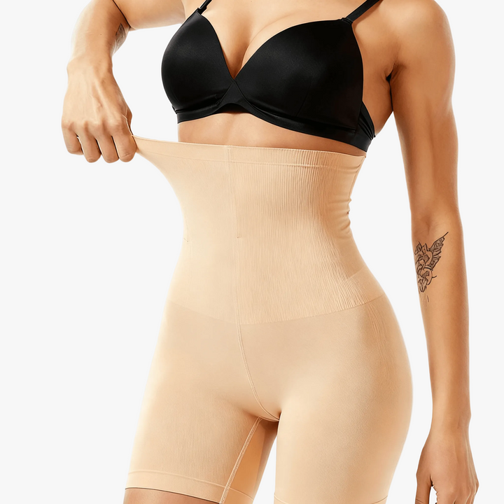 Nude high-waist shaping shorts worn with a black bra