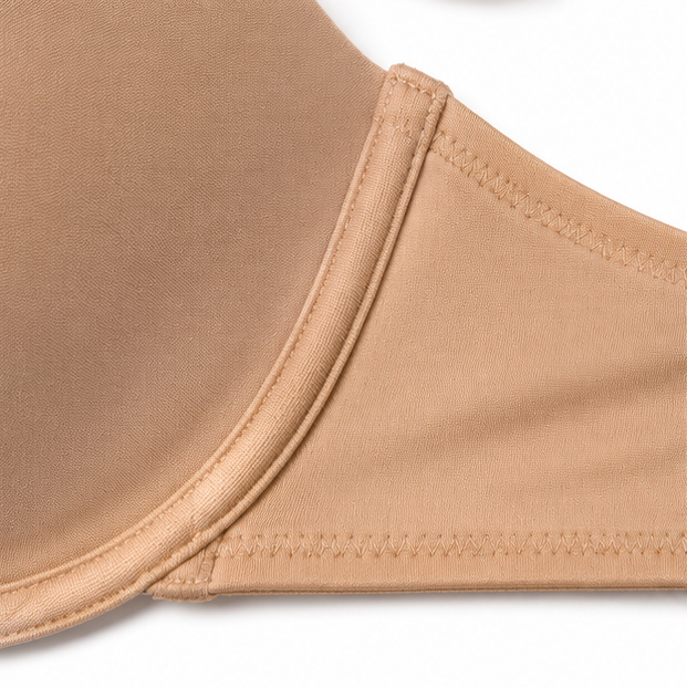 Close-up of the bonded cup edge on a nude bra