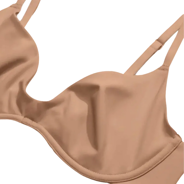 Close-up of the double-layer cup on a nude plunge bra