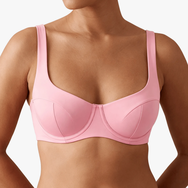 Pink unlined balconette bra worn on a body