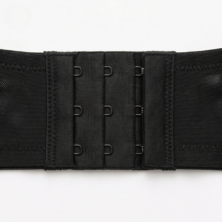 Close-up of the three-row hook and eye band in black