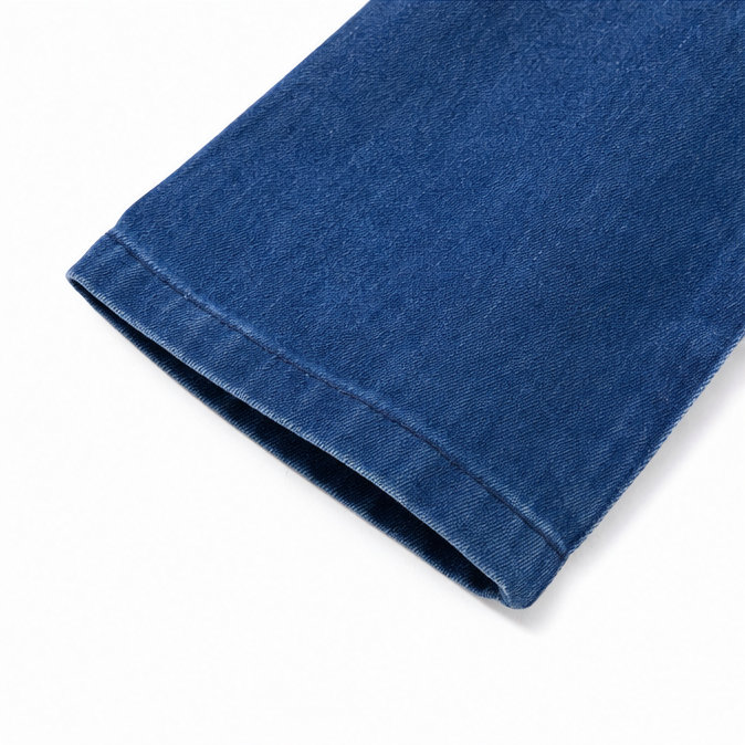 Stitched cuff detail on a denim look jacket sleeve
