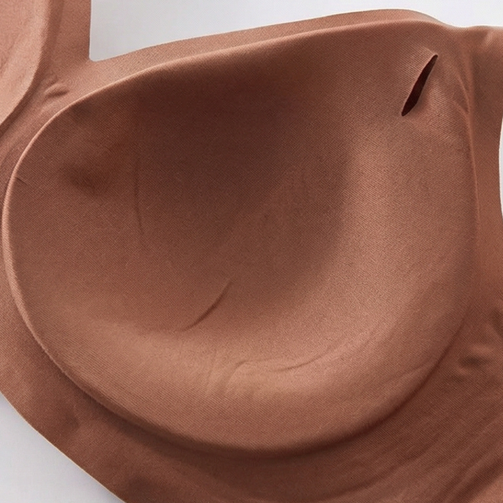 Close-up of a single moulded cup on a mocha bra
