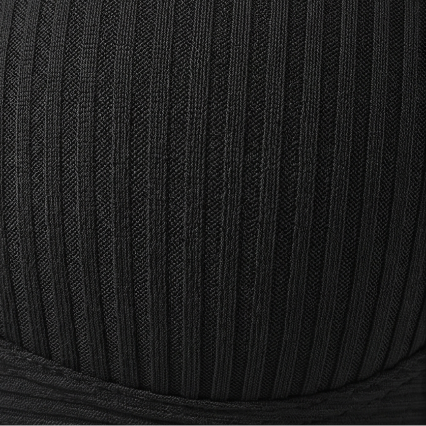 Close-up of the fine black rib knit fabric