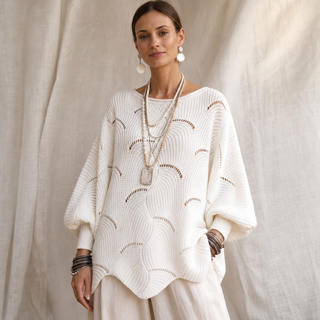 Cream wave openwork knit sweater with a wide boat neck