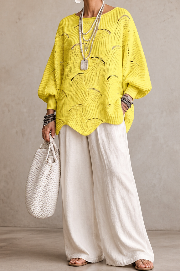 Yellow wave openwork batwing sweater with a scalloped hem