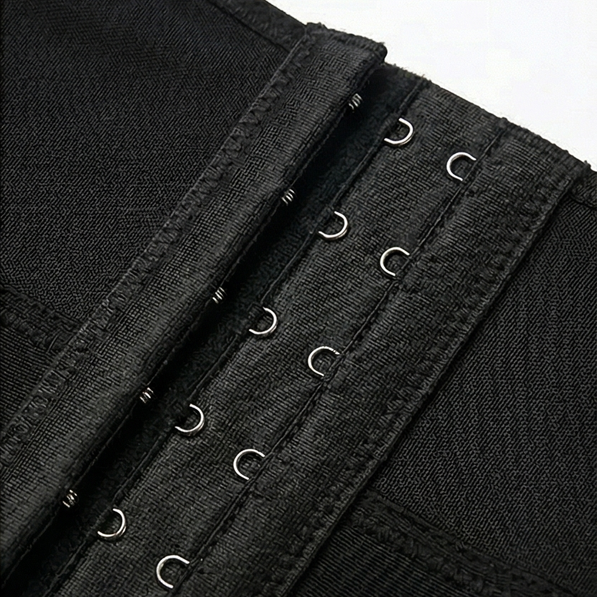 Close-up of the hook and eye column on a black shaper