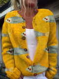 Yellow knit button front cardigan with a printed fish design