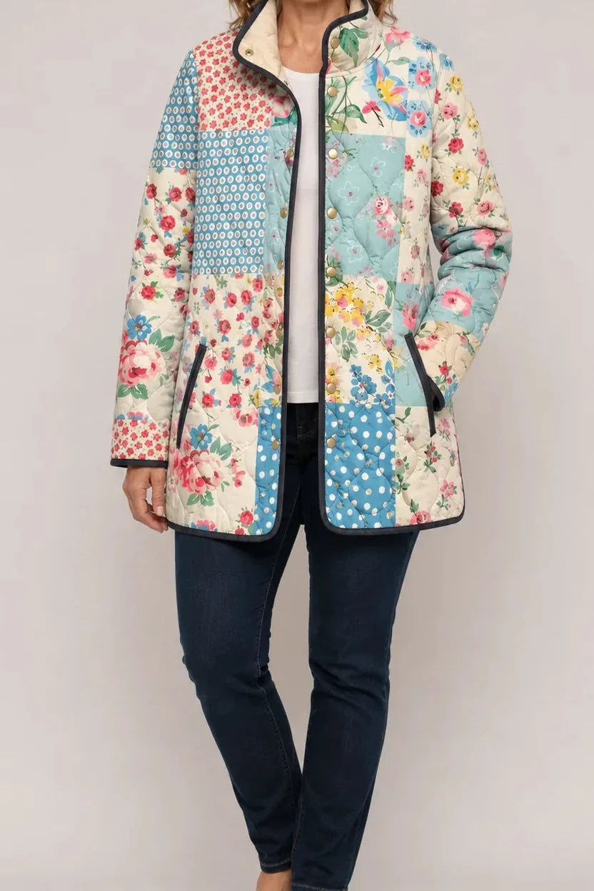 Patchwork print quilted jacket in pastel florals with a stand collar